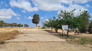 The monument with the plaza infront of it - Be'eri temporary cemetery 