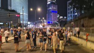 The protest is under the bridge, north of the Democracy square