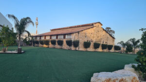 The RAF light bombers hanger from the British Mandate time. It is built from stone walls (with stone columns in between) and a light steel roof. It is the first of a kind to built in Israel (1925) and one of a kind (a few were built in Egypt but were demolished)