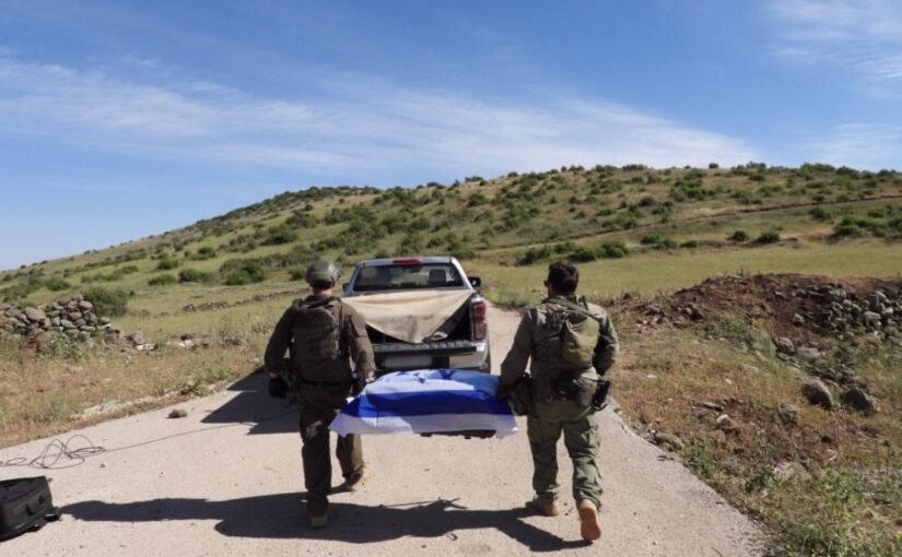 The body of Sgt.-Maj Tzvi Feldman on its way back to Israel