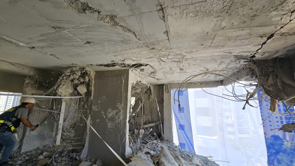 The room which got hit directly by an Iranian ballistic missile. The residents were killed. You can see room wall completely demolished and the deflection in the slab. - protected area