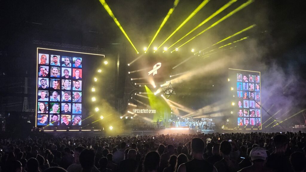 The names of the victims from October 7th screened during the concert