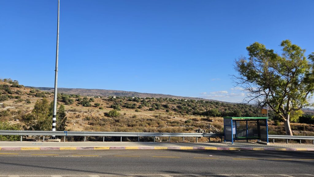 Kibbutz Snir on a hill above the junction
