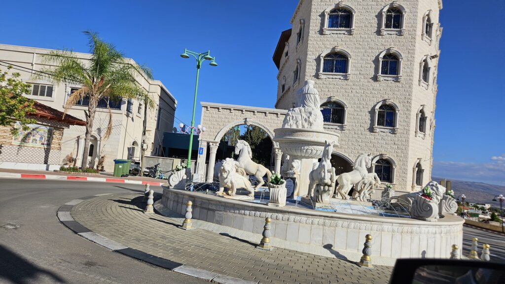 The statue of Imam Ali on the walkway above the Hasbani stream - visit in Ghajar