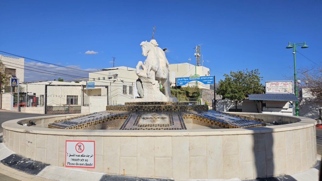 The satute of of Saint George, which the Alawites refer to as the El Hader, raiding his horse to kill the monster (or dragon). Next to the promenade over the Hasbani. - visit in Ghajar