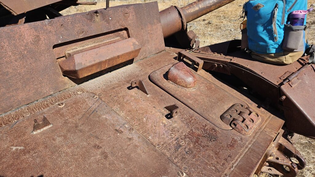 Panzer IV Syrian tank (bought after WWII) that was hit during War on the Water between Israel and Syria. - Front of tank, try to open door...