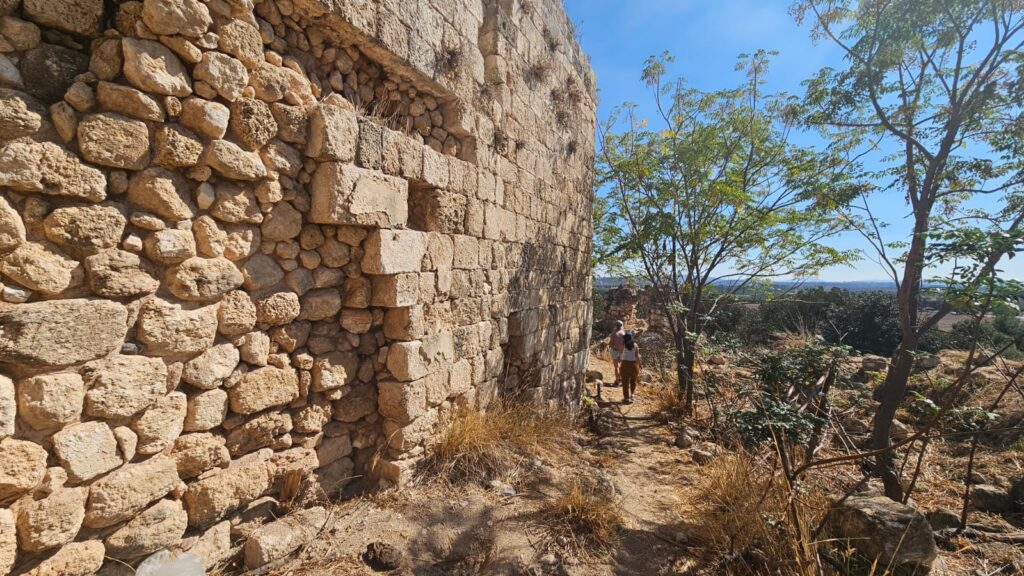 The walls are made from inner core and outer flat stones