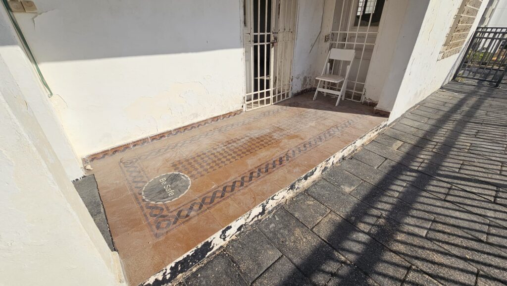 Original floor tiles outside the building