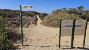 The cliff trail and a sign