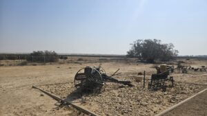Some of Mizpe Revivim old agriculture equipment and among it the tractor that was brought here on the first day and a D-2.