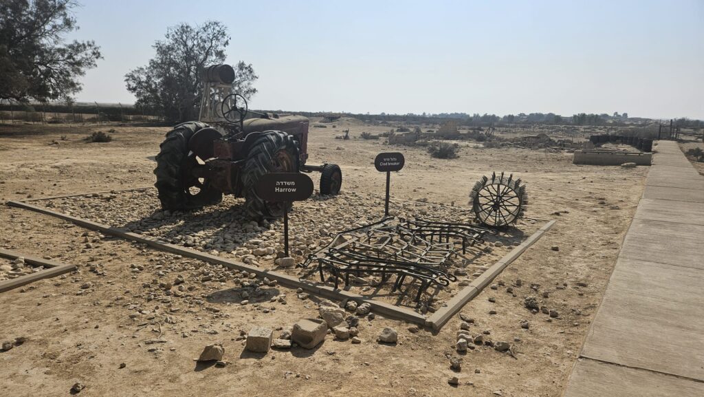 Some of Mizpe Revivim old agriculture equipment and among it the tractor that was brought here on the first day and a D-2.
