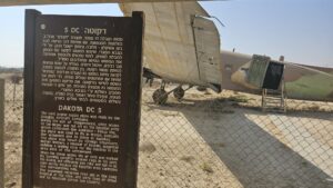 DAKOTA DC 3 - The twin engine supply plane was made by the Douglas Aircraft Company. During the war of independence, when access to the Negev was cut off by the Egyptian army which controlled the Ashkelon - Faluja line, the plane was used to fly in troops, evacuate the wounded and to bring in supplies. The plane was flown by foreign volunteers Michael Weimers, a member of Revivim, suggested building a landing strip for the Dakotas in the area east of the settlement. When the planes landed, the air strip was marked by burning paraffin soaked rags in tin cans (Goznikim). The loading and offloading was risky and had to be done quickly because the Egyptian army controlled the surrounding hills. The wounded received first aid in the field hospital at the cave, and were then air lifted out to hospitals across the country.