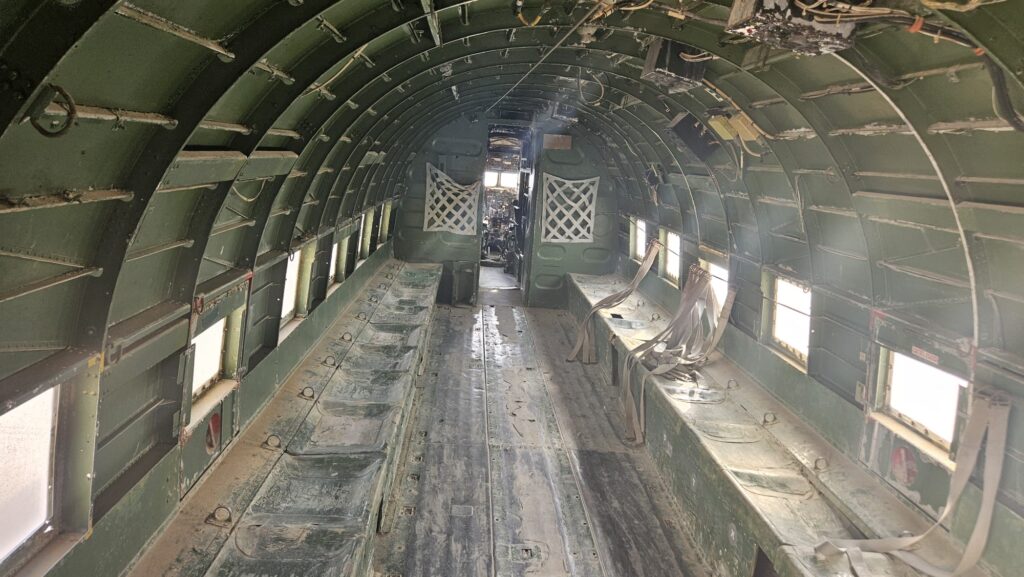 DAKOTA DC 3 - The twin engine supply plane was made by the Douglas Aircraft Company. During the war of independence, when access to the Negev was cut off by the Egyptian army which controlled the Ashkelon - Faluja line, the plane was used to fly in troops, evacuate the wounded and to bring in supplies. The plane was flown by foreign volunteers Michael Weimers, a member of Revivim, suggested building a landing strip for the Dakotas in the area east of the settlement. When the planes landed, the air strip was marked by burning paraffin soaked rags in tin cans (Goznikim). The loading and offloading was risky and had to be done quickly because the Egyptian army controlled the surrounding hills. The wounded received first aid in the field hospital at the cave, and were then air lifted out to hospitals across the country.