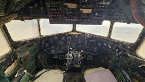 DAKOTA DC 3 - The twin engine supply plane was made by the Douglas Aircraft Company. During the war of independence, when access to the Negev was cut off by the Egyptian army which controlled the Ashkelon - Faluja line, the plane was used to fly in troops, evacuate the wounded and to bring in supplies. The plane was flown by foreign volunteers Michael Weimers, a member of Revivim, suggested building a landing strip for the Dakotas in the area east of the settlement. When the planes landed, the air strip was marked by burning paraffin soaked rags in tin cans (Goznikim). The loading and offloading was risky and had to be done quickly because the Egyptian army controlled the surrounding hills. The wounded received first aid in the field hospital at the cave, and were then air lifted out to hospitals across the country.