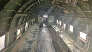 DAKOTA DC 3 - The twin engine supply plane was made by the Douglas Aircraft Company. During the war of independence, when access to the Negev was cut off by the Egyptian army which controlled the Ashkelon - Faluja line, the plane was used to fly in troops, evacuate the wounded and to bring in supplies. The plane was flown by foreign volunteers Michael Weimers, a member of Revivim, suggested building a landing strip for the Dakotas in the area east of the settlement. When the planes landed, the air strip was marked by burning paraffin soaked rags in tin cans (Goznikim). The loading and offloading was risky and had to be done quickly because the Egyptian army controlled the surrounding hills. The wounded received first aid in the field hospital at the cave, and were then air lifted out to hospitals across the country.