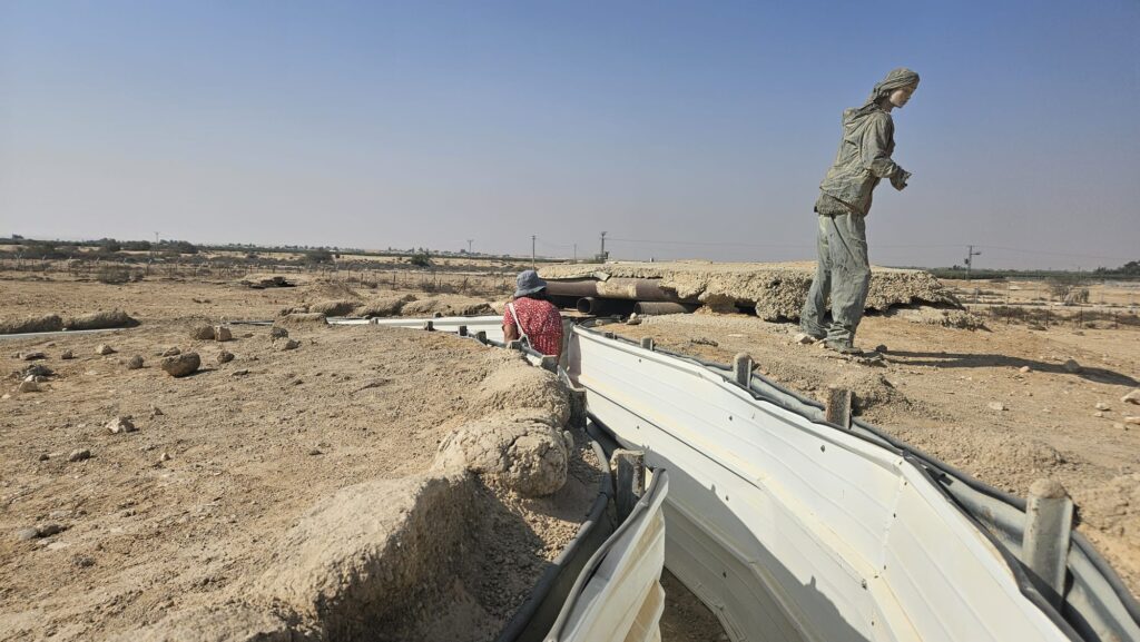 Getting in the connecting trenches, that were renovated and a note saying Revivim is rain.
