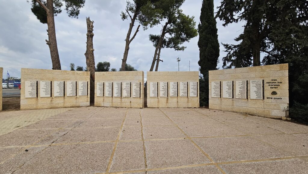 The stone walls with the names of the fallen engraved on it