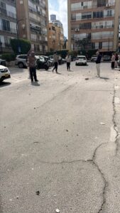 What fell down from the building down to the street