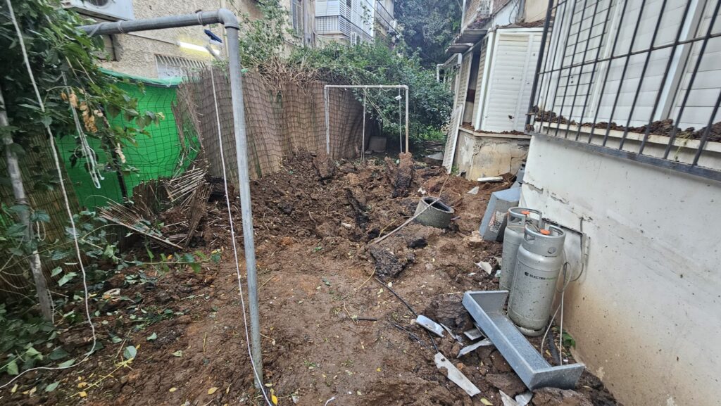 A carter from an interception fragment near a building in the end of our street, couple of meters to the side the building would probably have collapsed. - missile range