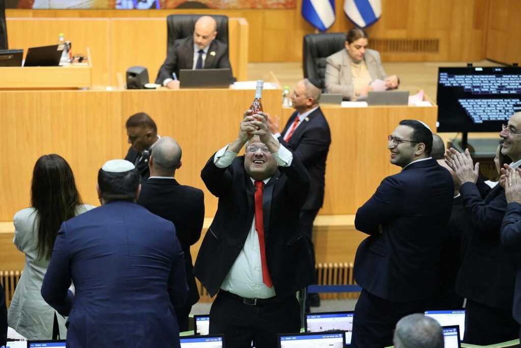 Itamar Ben-Gvir open a champagne, celebrating the terrorists death penalty law yesterday in the Knesset.