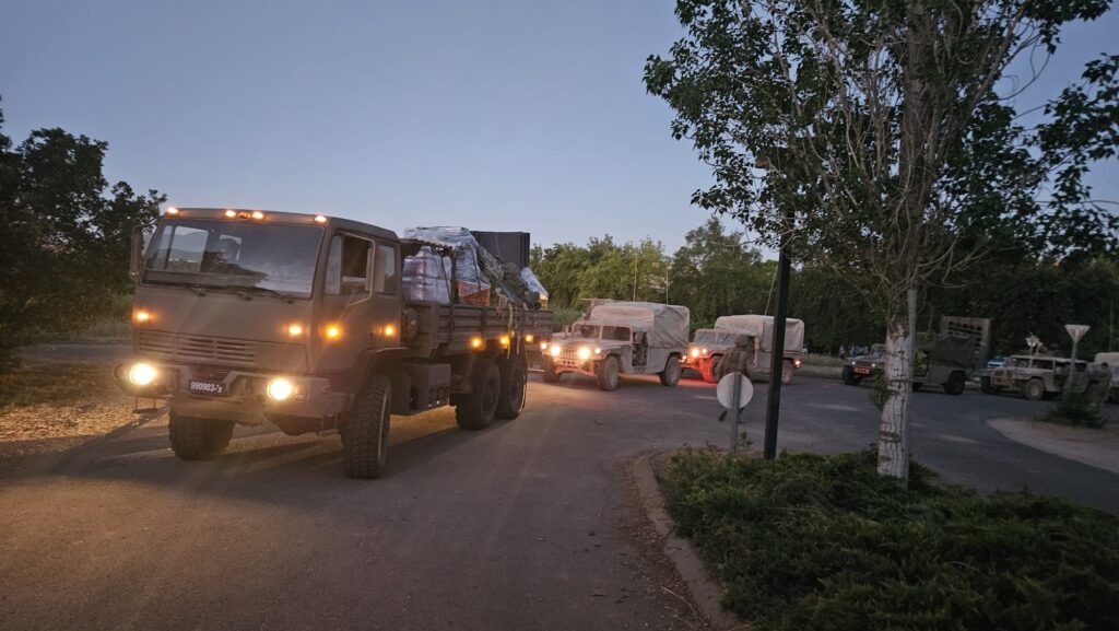A convoy on the way in to Lebanon - waiting for the darkness to get in. They were counting 3-2-1 when starting their engines - 3-2-1 and...