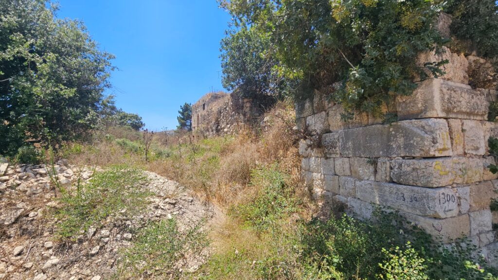 The south moat of Hunin Castle from the road