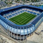 On top of Teddy stadium in Jerusalem (Source for left picture: Wikipedia.org) - solar panels